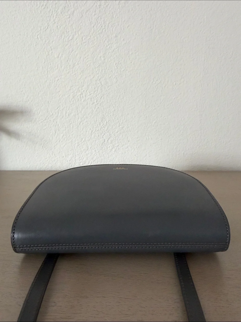 A.P.C. Half-Moon Leather Crossbody Bag in Black with Gold Logo